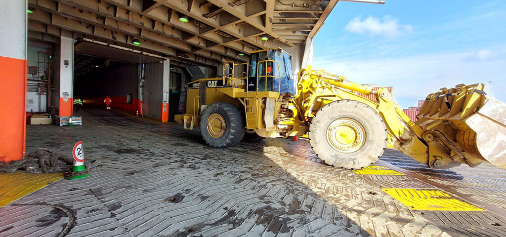 CAT excavator - High and Heavy RoRo logistics cargo.
